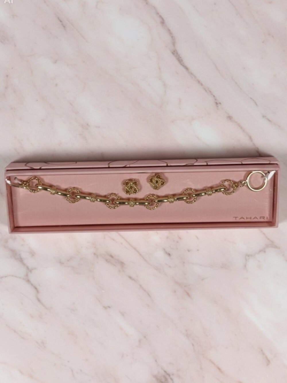 Tahari Gold bracelet and earring set